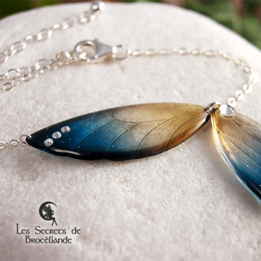 Bracelet ailes de fée de couleur bleu et or en résine, monture en argent 925. Fabrication artisanale.